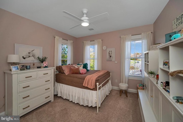 11001 Waterstone Pl, Spotsylvania, VA 22551 - bedroom with light colored carpet, multiple windows, baseboards, and ceiling fan