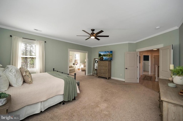 11001 Waterstone Pl, Spotsylvania, VA 22551 - bedroom with crown molding, light carpet, a ceiling fan, and baseboards