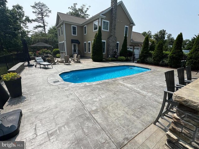 11001 Waterstone Pl, Spotsylvania, VA 22551 - view of swimming pool featuring a patio area
