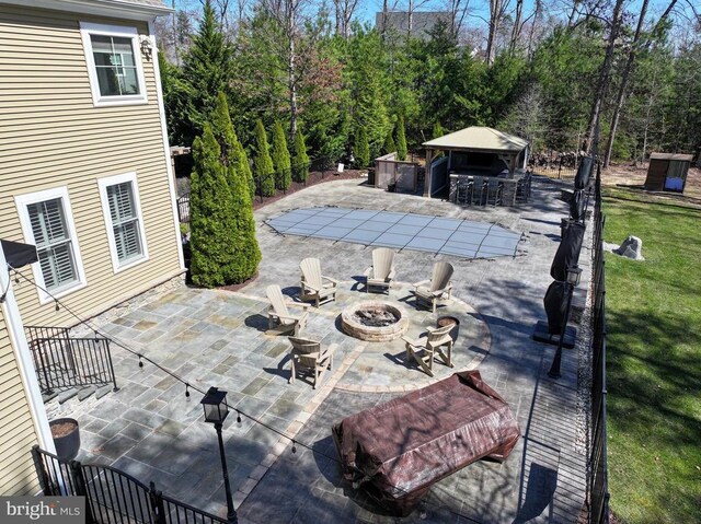 11001 Waterstone Pl, Spotsylvania, VA 22551 - view of patio with a fire pit, a gazebo, and a covered pool