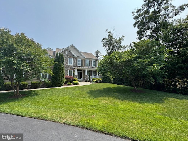 11001 Waterstone Pl, Spotsylvania, VA 22551 - craftsman house with stone siding and a front yard
