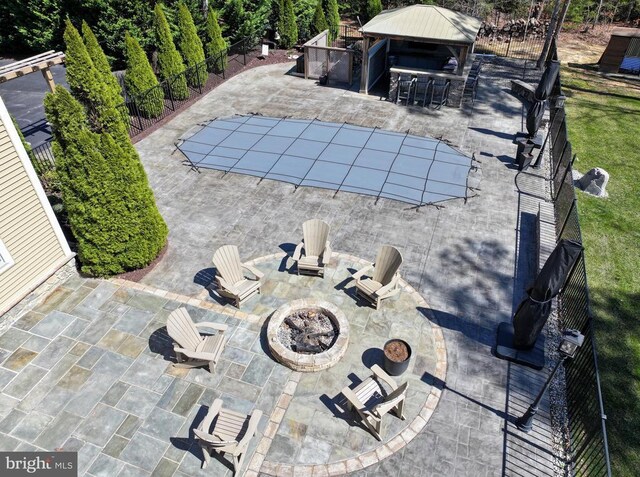 11001 Waterstone Pl, Spotsylvania, VA 22551 - view of pool with an outdoor fire pit, a patio area, a gazebo, and exterior bar