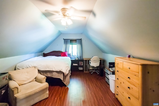 bedroom with vaulted ceiling, ceiling fan, and dark wood finished floors