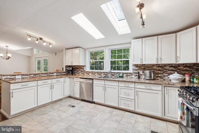 31055 Lumber Rd, Locust Grove, VA 22508 - kitchen featuring stainless steel appliances, a sink, backsplash, plenty of natural light, and vaulted ceiling
