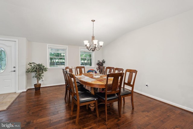 31055 Lumber Rd, Locust Grove, VA 22508 - dining room featuring a chandelier, vaulted ceiling, wood-type flooring, and baseboards