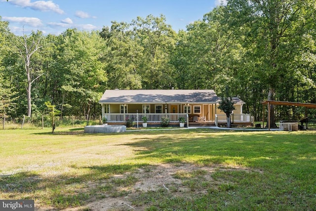 31055 Lumber Rd, Locust Grove, VA 22508 - view of front of home with a porch, a front yard, and a wooded view