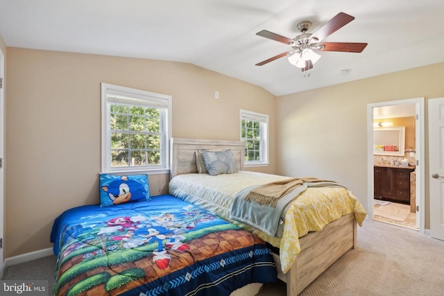 31055 Lumber Rd, Locust Grove, VA 22508 - carpeted bedroom featuring vaulted ceiling, baseboards, ensuite bathroom, and ceiling fan