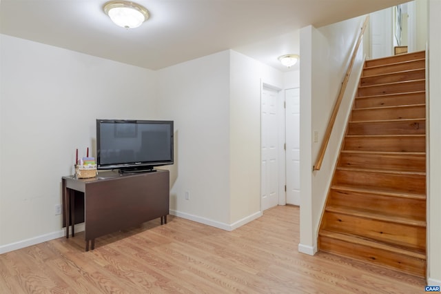 5031 Clearfields Ct, Crozet, VA 22932 - living area featuring light wood finished floors and stairs