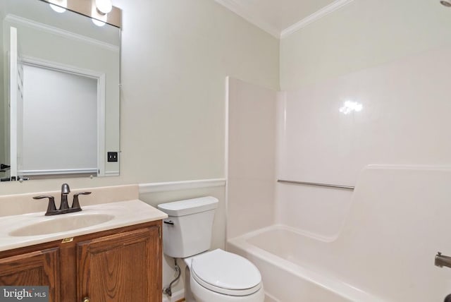  - bathroom featuring crown molding, vanity, and shower / bathtub combination