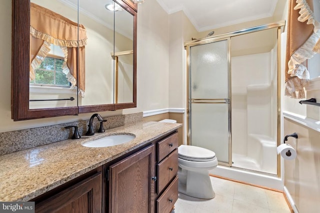 - bathroom with a stall shower, vanity, and ornamental molding