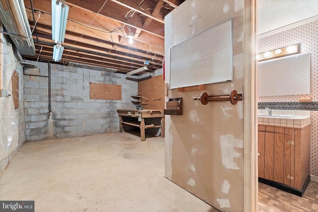  - unfinished below grade area with concrete block wall