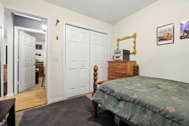 14975 Woodcreek Ln, Timberville, VA 22853 - bedroom featuring a closet and wood finished floors