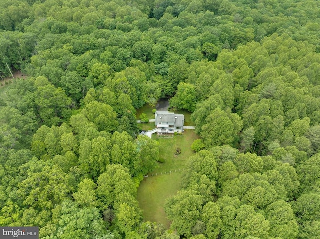  - view from above of property with a heavily wooded area