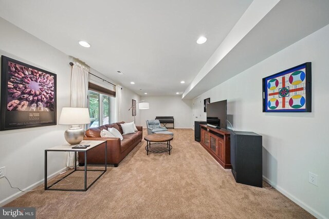  - living room featuring light carpet, recessed lighting, and baseboards
