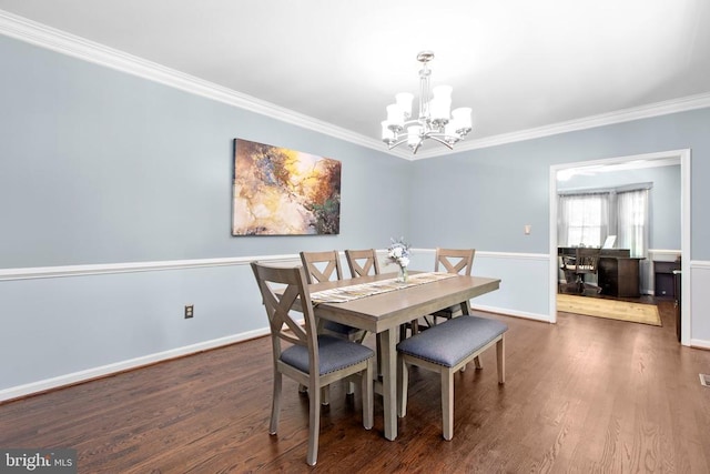 8314 Old Mill Ln, Spotsylvania, VA 22551 - dining space with a chandelier, crown molding, and wood finished floors