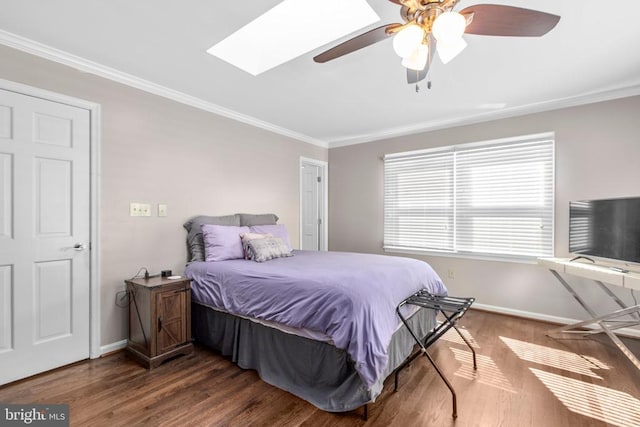 8314 Old Mill Ln, Spotsylvania, VA 22551 - bedroom with ornamental molding, wood finished floors, a skylight, and ceiling fan