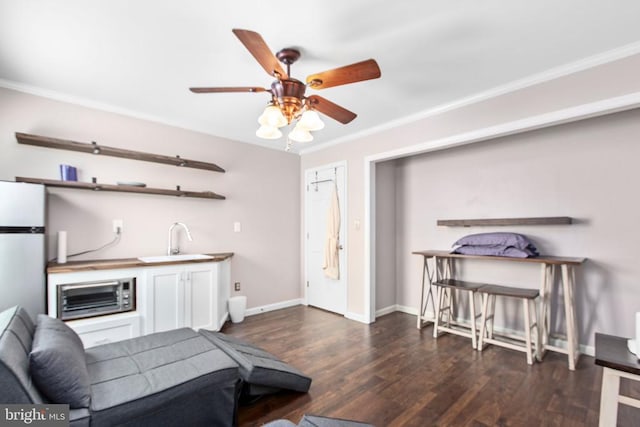 8314 Old Mill Ln, Spotsylvania, VA 22551 - living room featuring ornamental molding, dark wood-type flooring, and ceiling fan