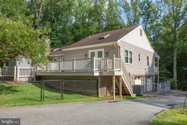 8314 Old Mill Ln, Spotsylvania, VA 22551 - view of front of house with a gate, a wooden deck, stairway, and driveway