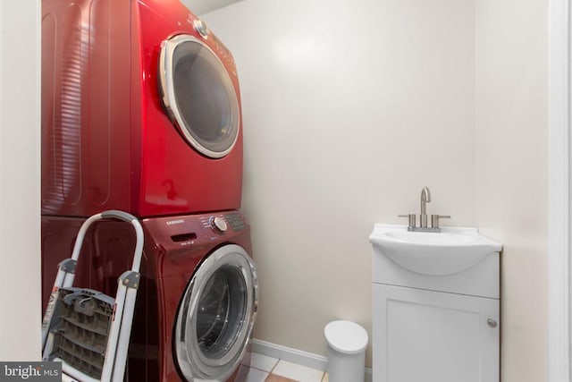 8314 Old Mill Ln, Spotsylvania, VA 22551 - laundry room with stacked washer / drying machine and tile patterned flooring