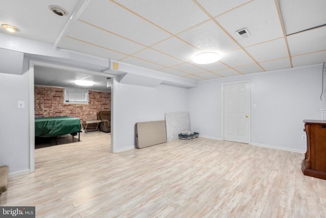 8314 Old Mill Ln, Spotsylvania, VA 22551 - finished basement with brick wall and wood finished floors