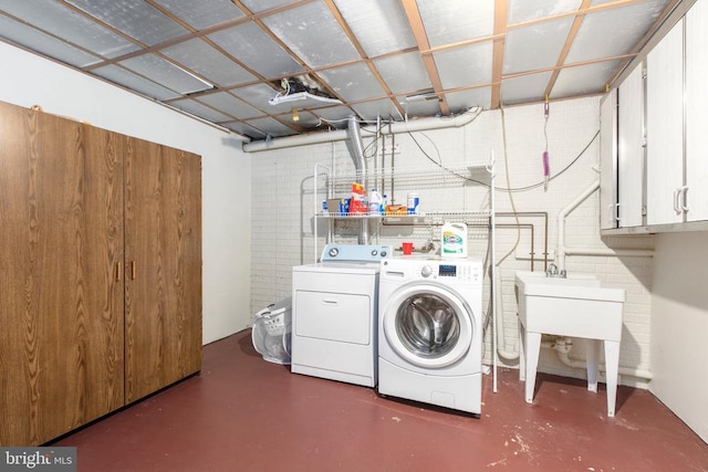 8314 Old Mill Ln, Spotsylvania, VA 22551 - laundry area featuring cabinet space and separate washer and dryer