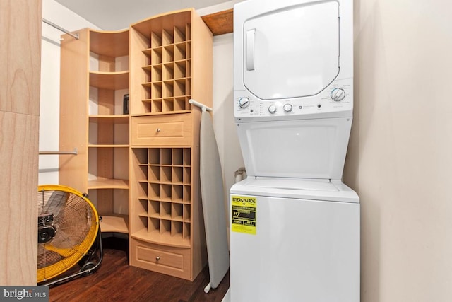 8314 Old Mill Ln, Spotsylvania, VA 22551 - washroom featuring estacked washer and dryer and wood finished floors