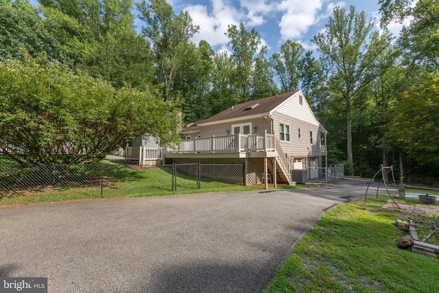 8314 Old Mill Ln, Spotsylvania, VA 22551 - view of front of home featuring stairway, asphalt driveway, and a deck