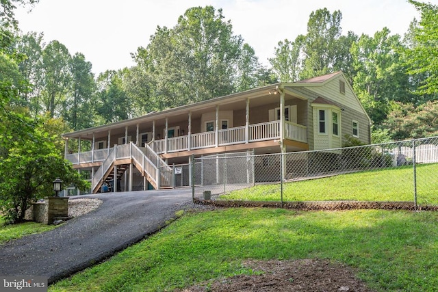 8314 Old Mill Ln, Spotsylvania, VA 22551 - view of front of house with stairway, asphalt driveway, and covered porch