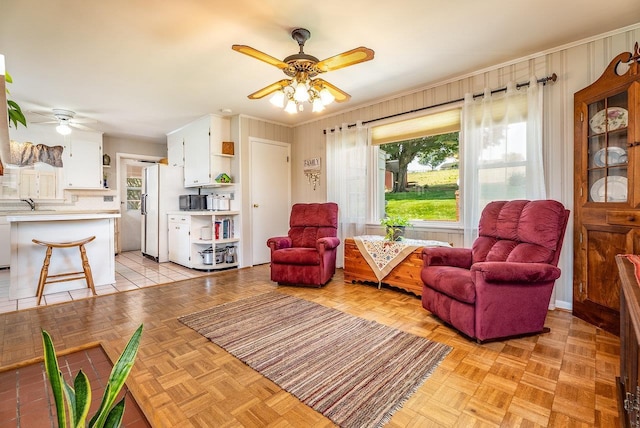 5213 Rawley Pike, Rockingham, VA 22801 - living room featuring ceiling fan and crown molding