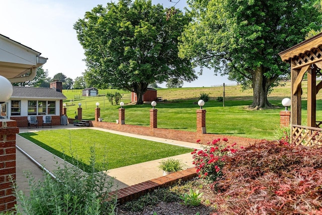 5213 Rawley Pike, Rockingham, VA 22801 - view of grassy yard featuring a patio area