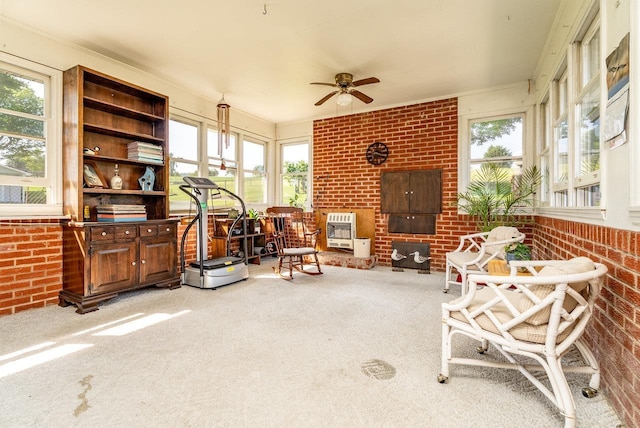 5213 Rawley Pike, Rockingham, VA 22801 - sunroom / solarium featuring heating unit, carpet floors, plenty of natural light, and brick wall
