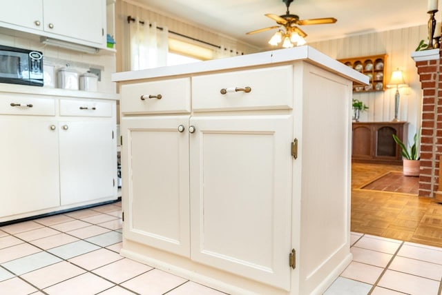5213 Rawley Pike, Rockingham, VA 22801 - kitchen featuring light countertops, white cabinetry, and ceiling fan