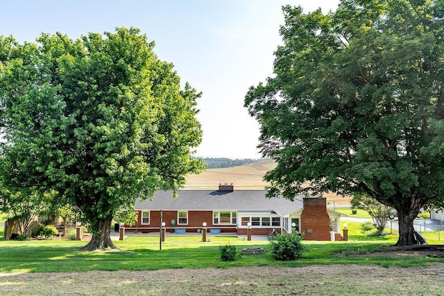 5213 Rawley Pike, Rockingham, VA 22801 - back of property featuring a chimney and brick siding