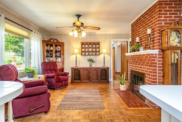 5213 Rawley Pike, Rockingham, VA 22801 - living area featuring ceiling fan, a brick fireplace, and ornamental molding
