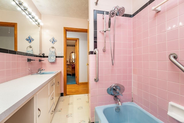 5213 Rawley Pike, Rockingham, VA 22801 - bathroom with vanity, shower / washtub combination, and a textured ceiling