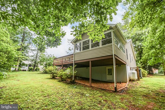 121 Jefferson Ave, Locust Grove, VA 22508 - back of property with a deck and a lawn