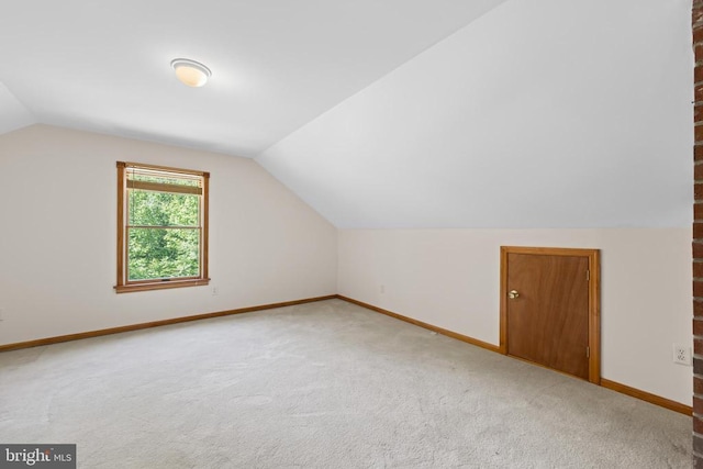 60 Mountain Breeze Ln, Syria, VA 22743 - additional living space featuring lofted ceiling, baseboards, and carpet flooring