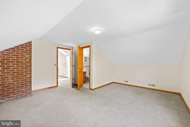 60 Mountain Breeze Ln, Syria, VA 22743 - additional living space featuring lofted ceiling, baseboards, and carpet