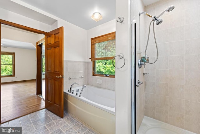 60 Mountain Breeze Ln, Syria, VA 22743 - full bathroom featuring a shower stall and a garden tub