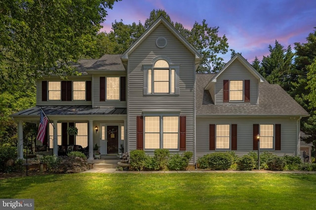17277 Kettlebrook Lndg, Jeffersonton, VA 22724 - view of front of home featuring a front yard, a shingled roof, a standing seam roof, and a metal roof
