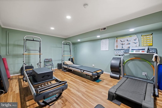 17277 Kettlebrook Lndg, Jeffersonton, VA 22724 - workout room featuring crown molding, wood finished floors, and recessed lighting
