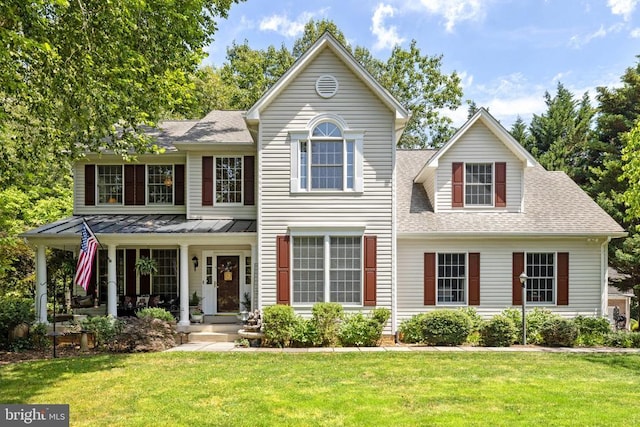 17277 Kettlebrook Lndg, Jeffersonton, VA 22724 - view of front facade with a front yard, roof with shingles, a standing seam roof, and a metal roof