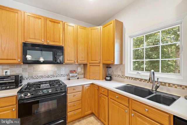 17277 Kettlebrook Lndg, Jeffersonton, VA 22724 - kitchen with black appliances, decorative backsplash, and light countertops
