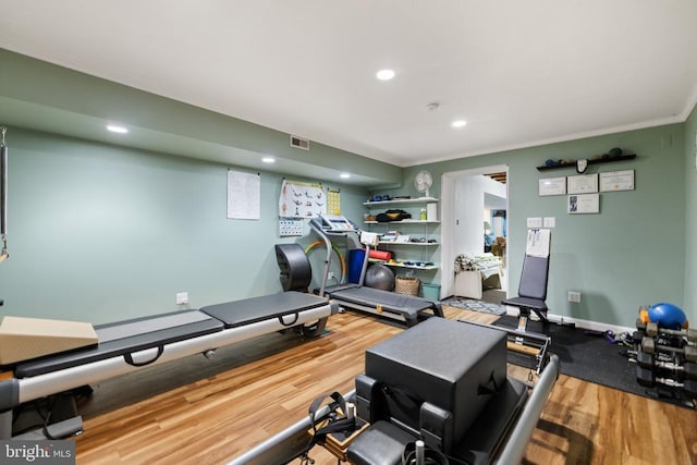 17277 Kettlebrook Lndg, Jeffersonton, VA 22724 - workout room with wood finished floors, ornamental molding, and recessed lighting