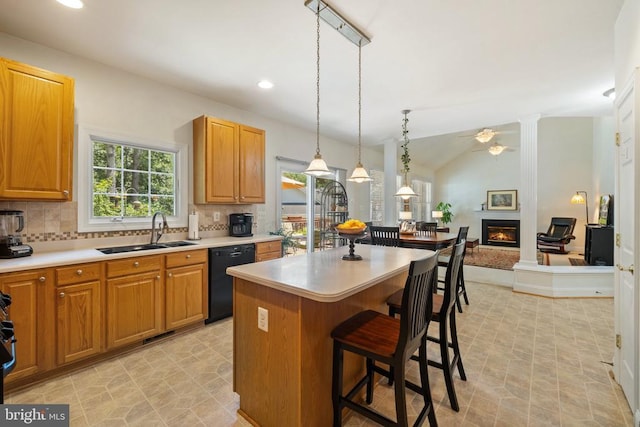 17277 Kettlebrook Lndg, Jeffersonton, VA 22724 - kitchen featuring dishwasher, backsplash, a ceiling fan, a breakfast bar area, and a center island