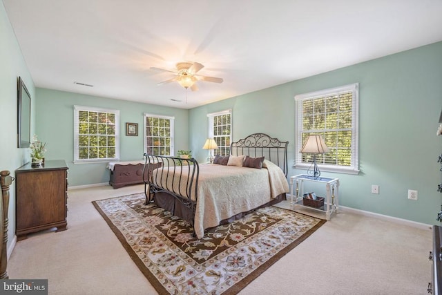 17277 Kettlebrook Lndg, Jeffersonton, VA 22724 - carpeted bedroom with multiple windows and a ceiling fan