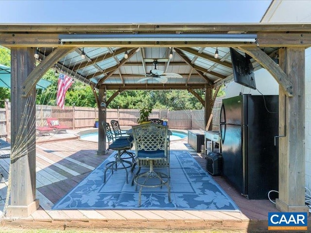 1700 Monticello Rd, Charlottesville, VA 22902 - view of patio / terrace with a ceiling fan, a fenced in pool, a deck, a gazebo, and a fenced backyard