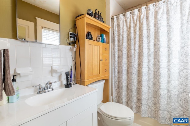 1700 Monticello Rd, Charlottesville, VA 22902 - bathroom with toilet, tile walls, a shower with curtain, and vanity