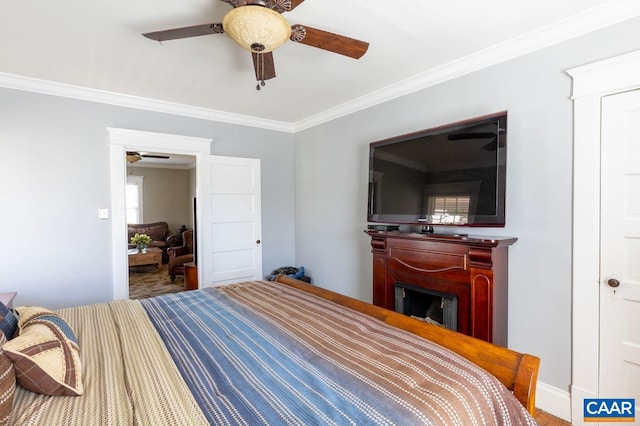 1700 Monticello Rd, Charlottesville, VA 22902 - bedroom with a ceiling fan, ornamental molding, and a fireplace