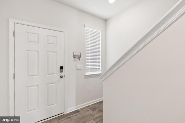 226 Baker Dr, Luray, VA 22835 - entrance foyer with wood finished floors, baseboards, recessed lighting, and healthy amount of natural light